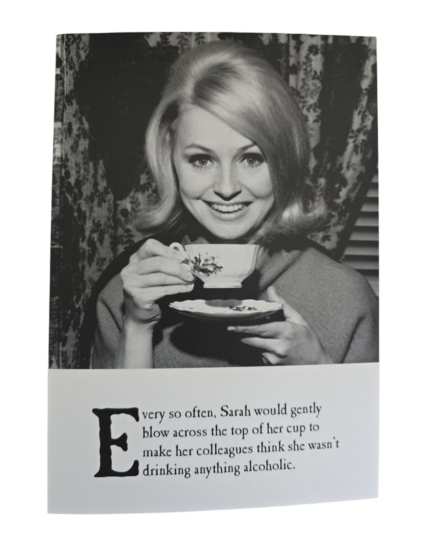 Every so often, Sarah would gently blow accross the top of her cup to make her colleagues think she wasn't drinking anything alcoholic.
