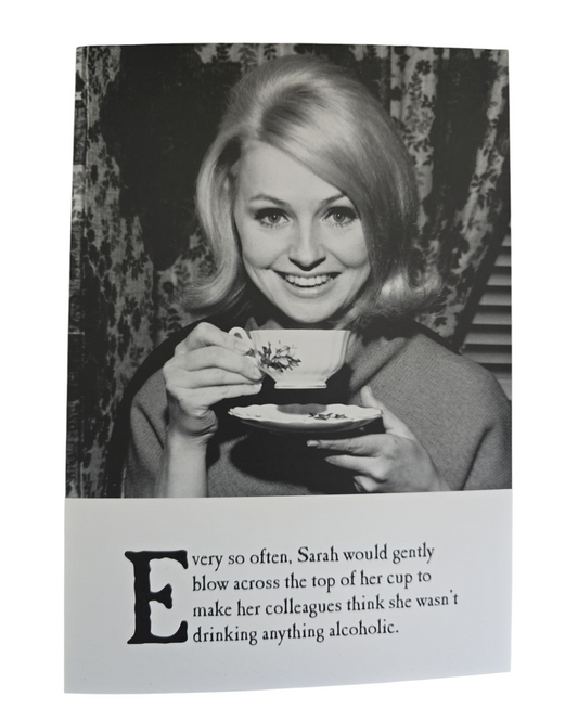 Every so often, Sarah would gently blow accross the top of her cup to make her colleagues think she wasn't drinking anything alcoholic.